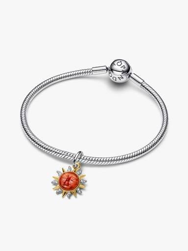 Dwutonowy charms-zawieszka Wirujące słońce