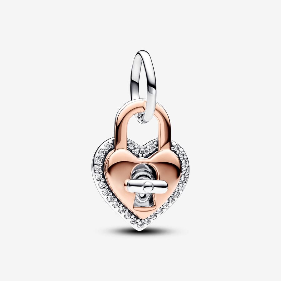 Podwójny dwukolorowy charms-zawieszka w kształcie serca z kłódką i przekręcanym kluczykiem. image number 0