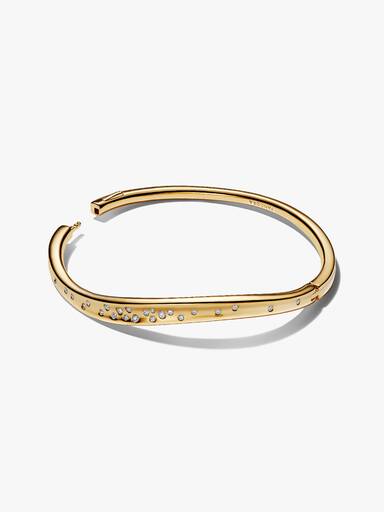 Bransoletka bangle o organicznym kształcie z lśniącymi kamieniami