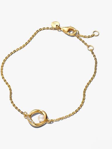 Krótki naszyjnik z zawieszką pavé o organicznym kształcie i obrobioną słodkowodną perłą hodowaną