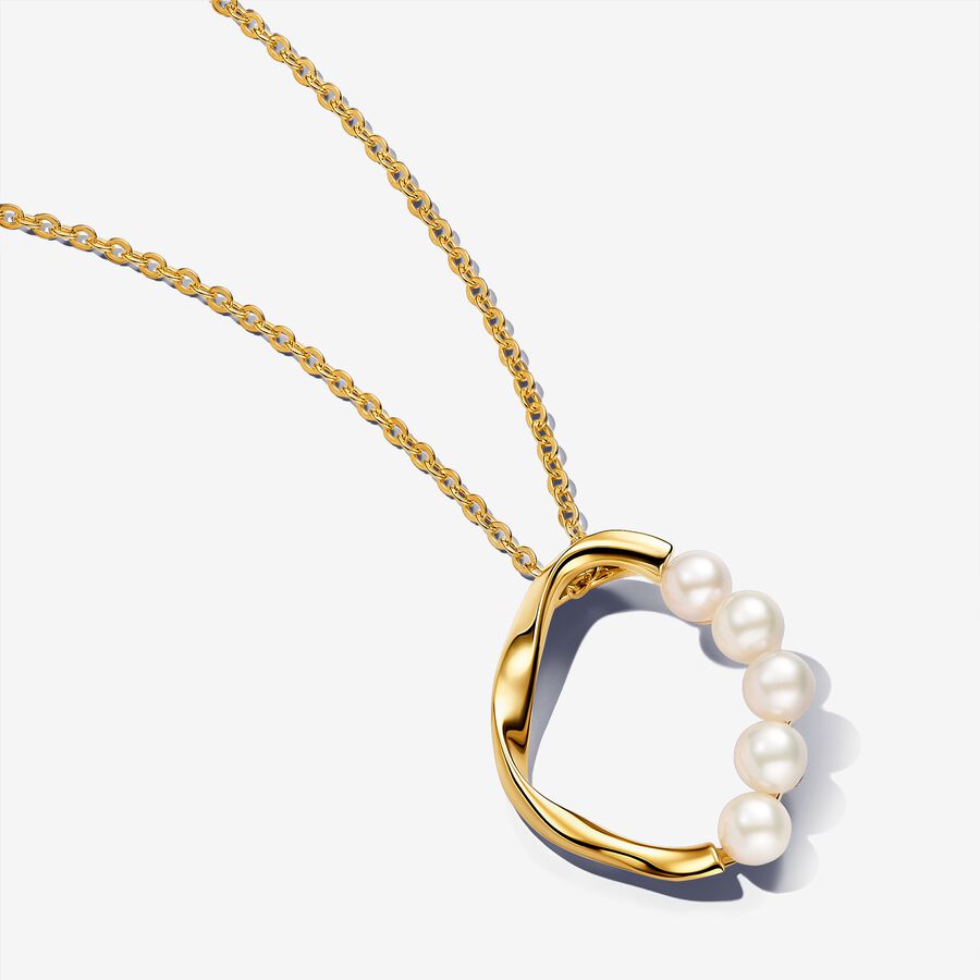Naszyjnik z okrągłą zawieszką o organicznym kształcie i obrabianymi słodkowodnymi perłami hodowanymi image number 0