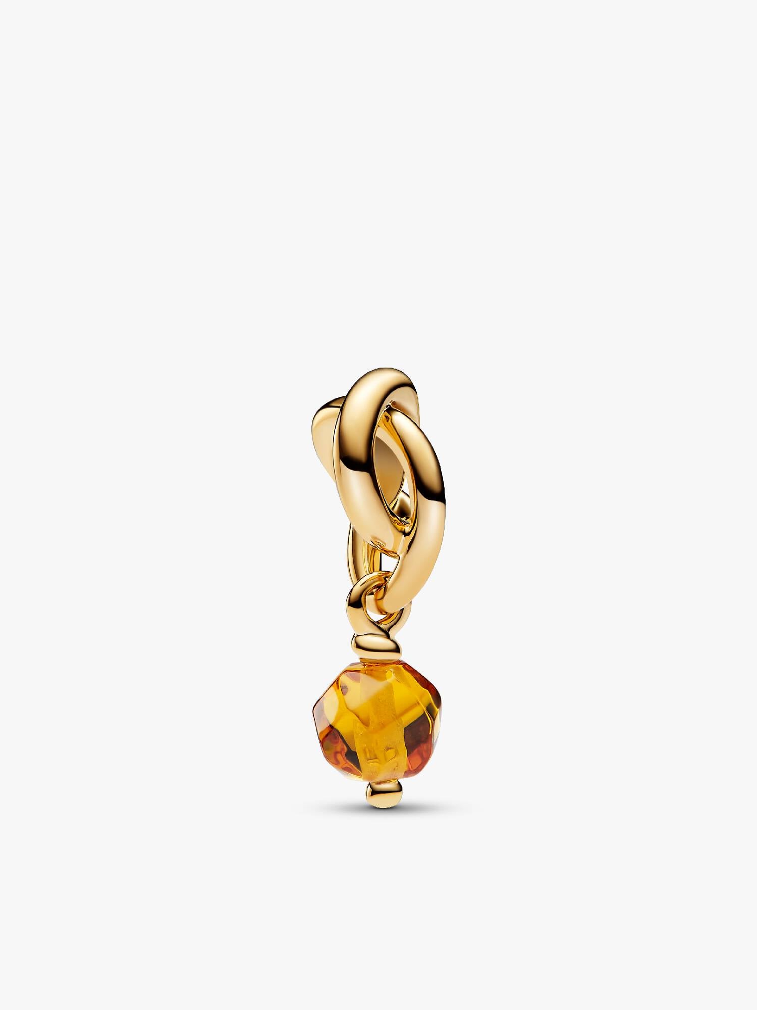 Fasetowany charms-zawieszka Miodowy symbol wieczności